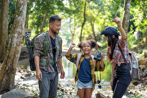 A family on an outdoor adventure at a popular attraction in Terengganu.